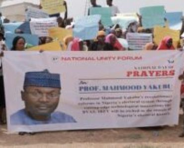 (PHOTOS): Group Holds Solidarity Rally And Organises Prayers For INEC Chairman