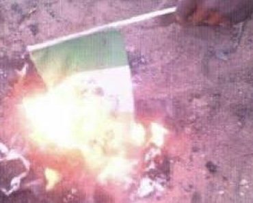 BREAKING: “Northerners Are Feeding On Leaves” – Northern Youths Burn Nigerian Flag As They Lament Over Hardship