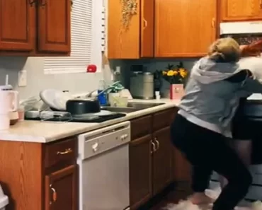 EXCLUSIVE: Guy pranks his girlfriend by dressing as another woman in their house and she beats him up [VIDEO]